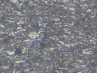 100 m Gambar 14. Foto struktur mikro daerah logam induk dengan normalizing (100 ) Gambar 11.