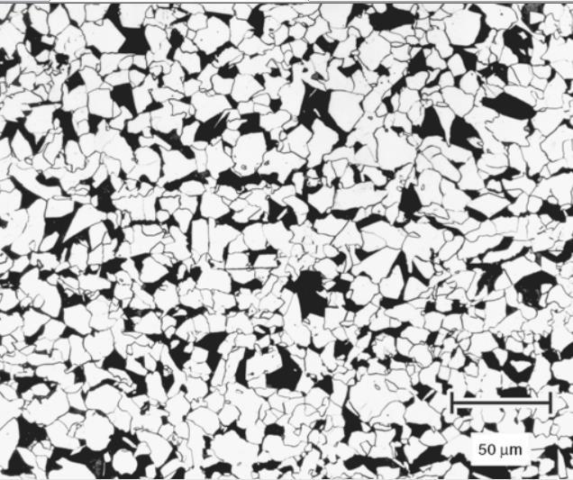 24 Gambar 2. 9 Struktur mikro baja UNS G10150, terdiri atas ferrit (terang) dan perlit (gelap).