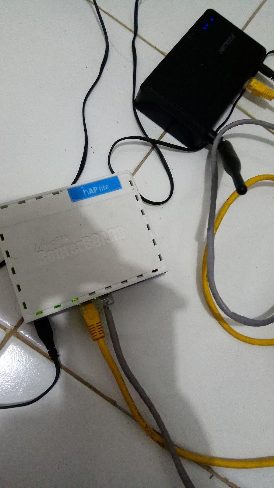 Test fisik dengan menggunakan router mikrotik RB 941-2nD hap lite yang support radius, catatan prolink
