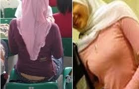 jilbab yang seharusnya menutupi dada tetapi malah dililitkan ke leher atau diselampirkan dipundak.