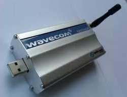 33 Gambar 3.8 Modem Wavecom Fastrack 1306B Serial dan USB 3.2.