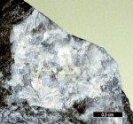 Prehnite Ca 2 Al(AlSi 3 O 10 )(OH) 2, Mineral ini menunjukkan warna kehijauan, sistem kristal orthorombic, belahan sempurna, pecahan tidak rata, kilap kaca, cerat berwarna putih dan menunjukkan