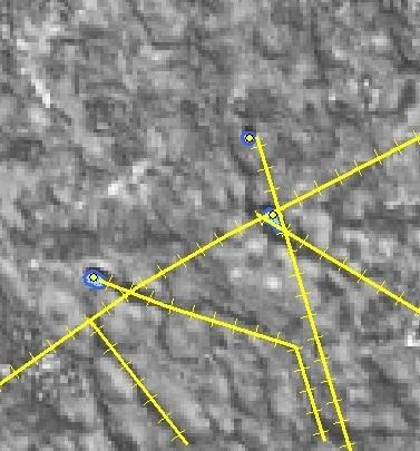 morfologi negatif pada citra Landsat 8 pankromatik dikenali dengan rona cerah pada luasan yang mengelompok serta bentuk tertentu serta berada pada daerah yang relatif lebih rendah.