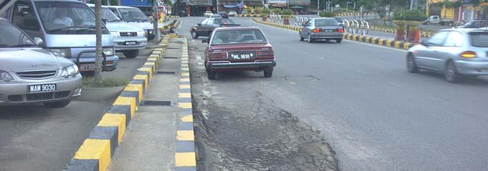 Foto 7 Kerosakan Jalan raya Sumber : Jabatan Audit Negara Tarikh: 4 November 20