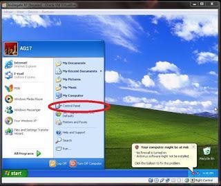 Di control panel OS Guest (windows XP), ganti alamat IP menjadi alamat IP yang satu jaringan