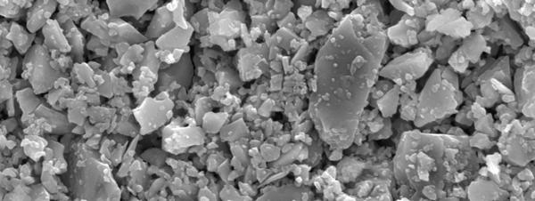 struktur mikro permukaan membran keramik ZrSiO 4 campuran B setelah di-sinter pada temperatur 1300 o C. Gambar IV.