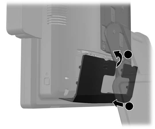 10. Pasang kembali penutup I/O belakang dengan menempatkan kait pada bagian bawah penutup ke dalam slot pada bagian bawah casis/rangka (1).