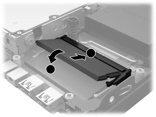 11. Masukkan SODIMM baru ke dalam soket pada sudut sekitar 30 (1), lalu tekan SODIMM ke bawah (2) sehingga slot menguncinya di dalam tempatnya.