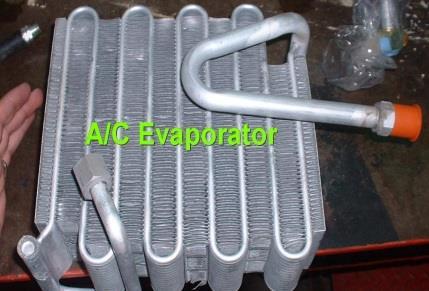 a. Compressor Compressor terbagi menjadi dua bagian, yaitu: 1) Compressor Kompresor di gerakkan oleh tali kipas dari puli engine.